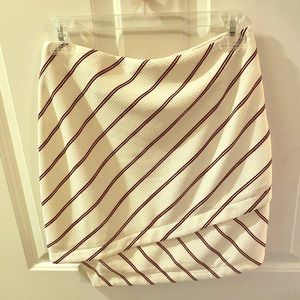 White and black asymmetrical wrap mini skirt